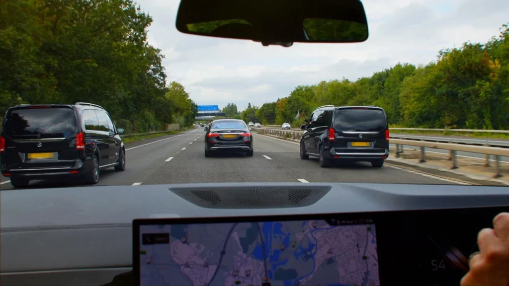 black-cars-driving-down-the-motorway